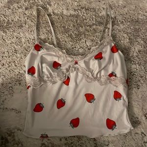 white top with strawberry print, size- xs, soft, has ruffles